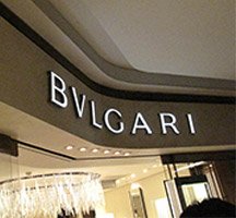 Bulgari store façade with coloured stainless steel PVD coating Chrome SS003-SB to sign lettering.
