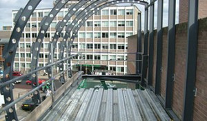 The footbridge under construction showing structure for glazed roof.