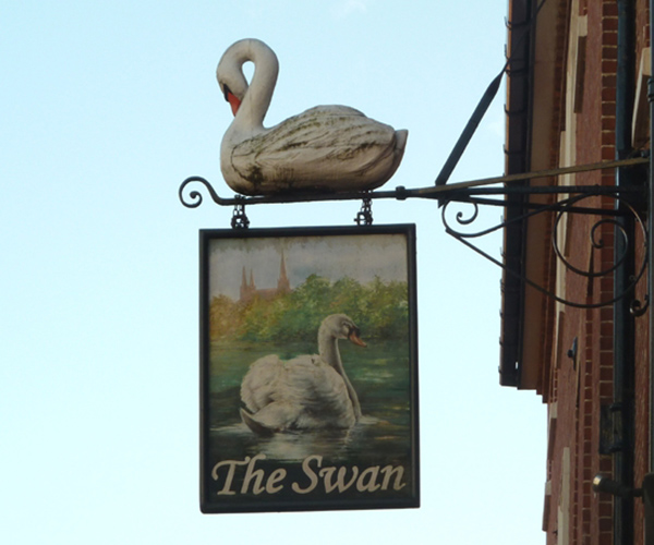 Traditional pub sign from mediaeval origins