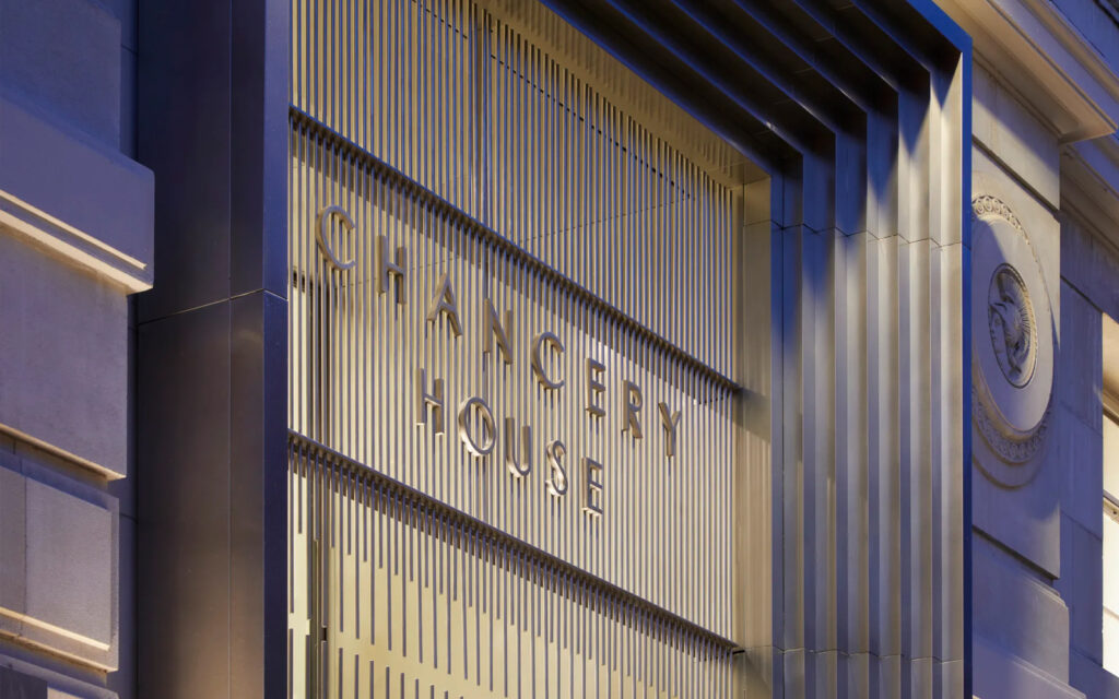 Portal including signage to Chancery House, London in stainless steel Vibration finish.