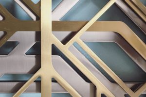 Laser-cut PVD coloured stainless steel in Brass, Bronze and Gun Metal Vibration.