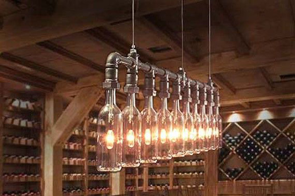 A suspension lamp made from wine bottles