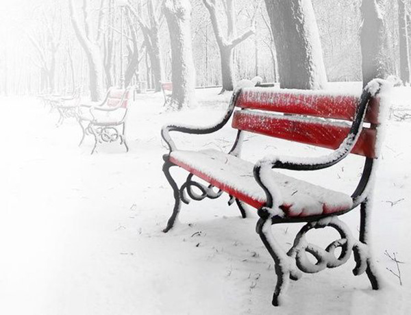 Typical romantic scene featuring a Victorian park bench