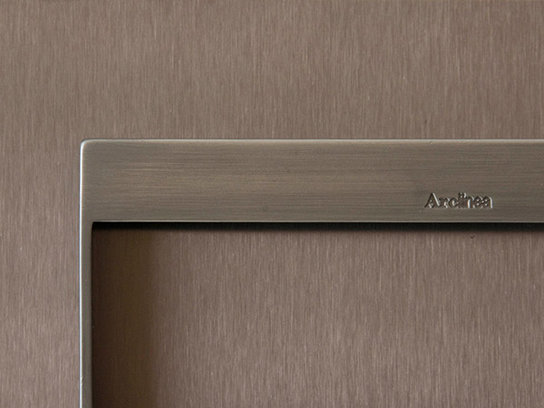 Arclinea Italia now manufacture stainless steel kitchen cabinet doors in a hairline bronze finish PVD