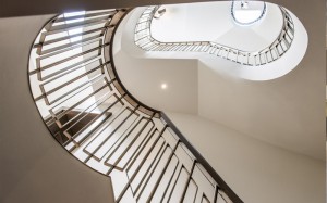 Main helical staircase to 54 Bedford Gardens, Notting Hill, London, UK - Client and main contractor, Bancroft Heath - Architect: Nash Baker - Interior Designer: Desalles Flint - Architectural metalworks and PVD coated coloured stainless steel: John Desmond Ltd.