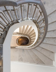 Looking down through the centre of the helical staircase. Architect: Nash Baker Interior Designer: Desalles Flint Architectural metalworks and PVD coated coloured stainless steel, John Desmond Ltd.