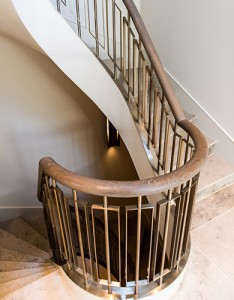 Showing the staircase with handrail in stained oak. Architect: Nash Baker Interior Designer: Desalles Flint Architectural metalworks and PVD coated coloured stainless steel, John Desmond Ltd.