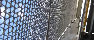 100m stainless steel mesh veil acting as a safety screen Wood Lane Underground Station, London, UK