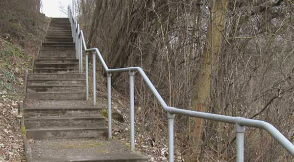 Old fashioned pipe railing of the style that was very popular during the 1950s and 1960s and is still going strong today