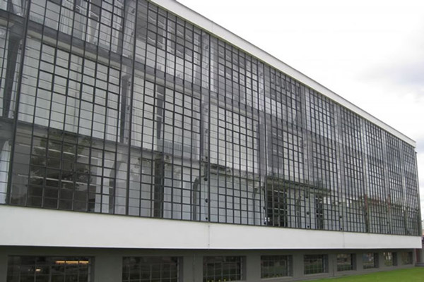 The glass curtain wall of the Bauhaus School by Walter Gropius, Dessau, Germany. Photo from KSA Digital Library