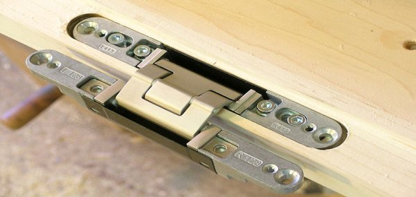 Tectus concealed door hinge. Photo by This is Carpentry