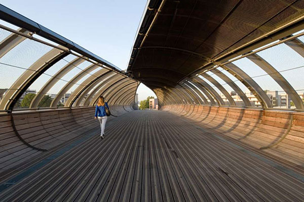 Footbridge providing panoramic view of Paris and connecting rail links, Villetaneuse, Paris