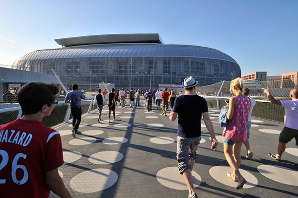 Football fans arriving at Lille Stadium for a UEFA cup match, June 2016.