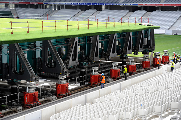 The massive hydraulic cylinders beneath the pitch in the Lille Stadium