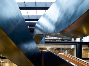 The natural waxed finish on the blackened stainless steel and the varying effects of daylight that play on it Google offices, 6 Pancras Square, London, UK Photography by Tim Soar