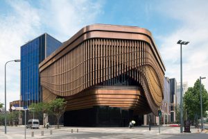 The dramatic and imaginative architecture of the Shanghai Bund Arts and Cultural Centre with its façade made from PVD stainless steel in Rose Gold Vibration. Architects: Foster & Partners; Heatherwick Studio PVD: John Desmond Ltd, Photography by Tim Franco.