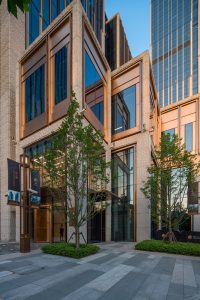 PVD stainless steel in Rose Gold Vibration is used for door reveals and wide-format glazing bars, Shanghai Bund Financial Centre. Architects: Foster & Partners; Heatherwick Studio PVD: John Desmond Ltd, Photography by Tim Franco.