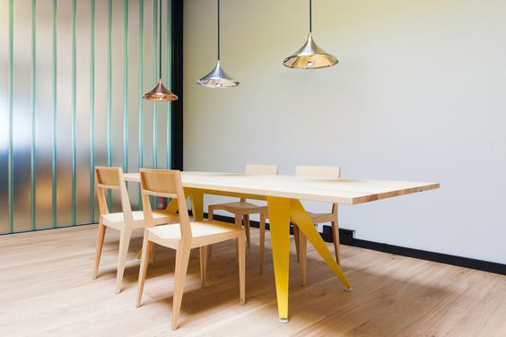 45 Kilo’s The Busy Table designed by 45 Kilo and produced by MYKILOS (founded by 45 Kilo). Base in powder-coated steel and top in linoleum and blockboard. Here shown in RAL 1018 Zinc Yellow.