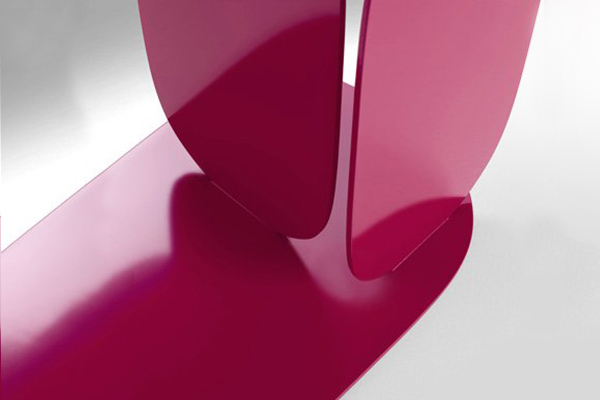 The Caramel table designed by Claesson Koivisto Rune shown in RAL 4010 Telemagenta powdercoat