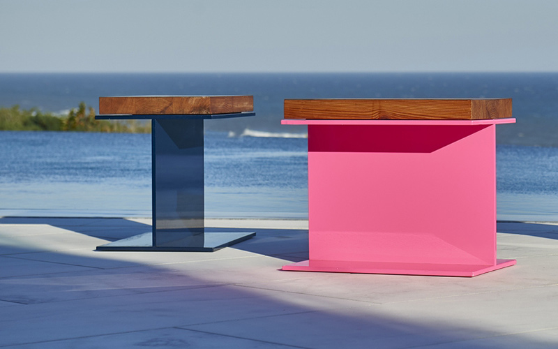 Katch I.D.’s Lucky Beam, used as seat or table, enjoying a location shoot in Montauk, shown in Sea blue and Pink. Fabricated from powder-coated aluminium.