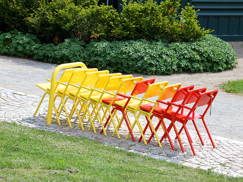 Thomas Bernstrand’s coin-operated chairs for public space use. Manufactured from powdercoated steel and shown in the standard yellow, RAL reference 1018 and Pillar box red.