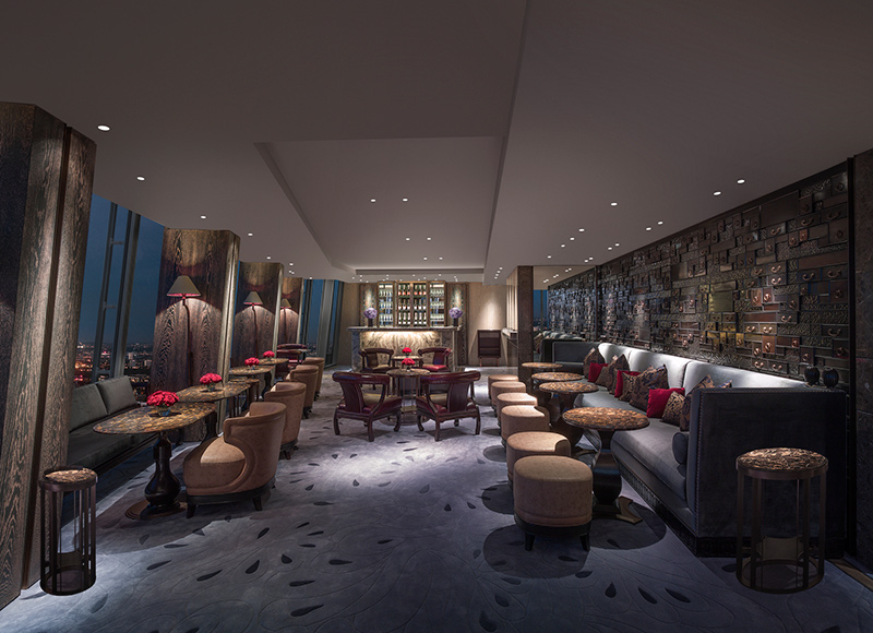 The GŎNG bar, Shangri-La at the Shard, London by André Fu’s AFSO interiors. - The inward-sloping floor to ceiling windows create a dramatic element with the view of London beyond.
