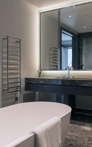 Marble and bronze PVD stainless steel bathroom fixtures, Bathroom, Bedford Gardens, London. Architects: Nash Baker Interior Designers: DeSalles Flint Architectural metalwork & PVD stainless steel: John Desmond Ltd