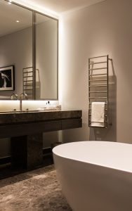 Marble and bronze PVD stainless steel fixtures. Bathroom, Bedford Gardens, London. Architects: Nash Baker Interior Designers: DeSalles Flint Architectural metalwork & PVD stainless steel: John Desmond Ltd