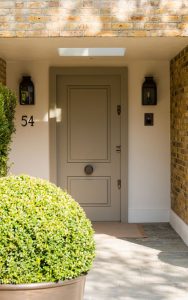 Entrance with patinated brass planters and railings. - Bedford Gardens, London. - Architects: Nash Baker - Interior Designers: DeSalles Flint - Architectural metalwork & specialist metal finishes: John Desmond Ltd