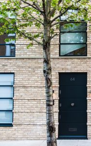 Entrance to mews house, Bedford Gardens, London. Architects: Nash Baker Interior Designers: DeSalles Flint Architectural metalwork & PVD stainless steel: John Desmond Ltd