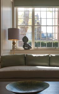 Ground floor formal sitting room looking towards front garden. Bedford Gardens, London. Architects: Nash Baker Interior Designers: DeSalles Flint Architectural metalwork & PVD stainless steel: John Desmond Ltd