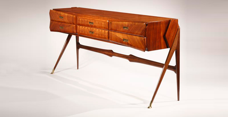 Ico Parisi (Italian, 1916–1996) and Luisa Parisi (Italian, 1914–1990), Sideboard. Mahogany with lacquered brass mounts, about 1955. 36 by 81 ½ inches. Held in the Toledo Museum of Art, Gallery 18 if you would like to go and see it.