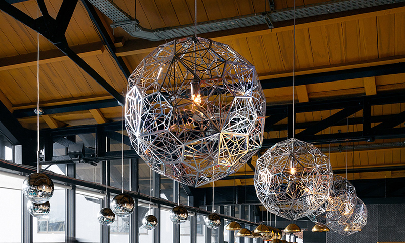 Tom Dixon’s Etch Web light fitting constructed from stainless steel