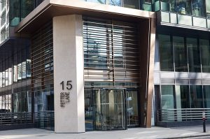 15 Fetter Lane, EC4A, London. Brise Soleil, tapered column and canopy in Chocolate PVD stainless steel V-Grooved and folded to appear as solid bronze. - Architects: McBains Cooper - Client: British Steel Pension Fund Trustees Ltd - Fit-out: Nucom Interiors - PVD stainless steel & fabrication: John Desmond Ltd