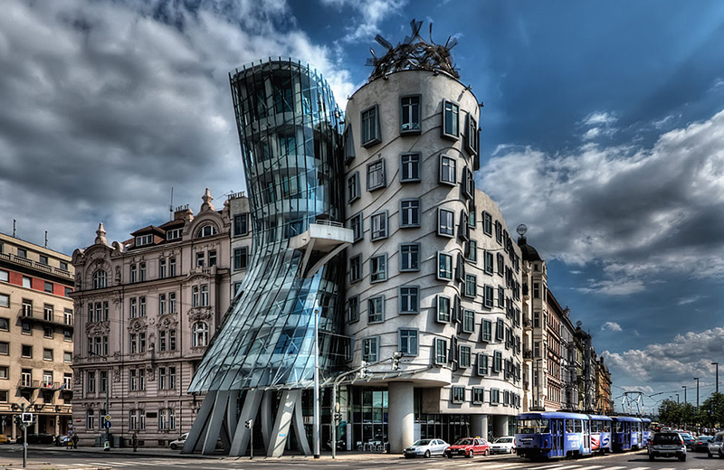 Prague’s Nationale-Nederlanden building designed by Vlado Milunić and Canadian Frank Gehry. The shape of the building was created by the use of 99 concrete panels, each a different shape and dimension.