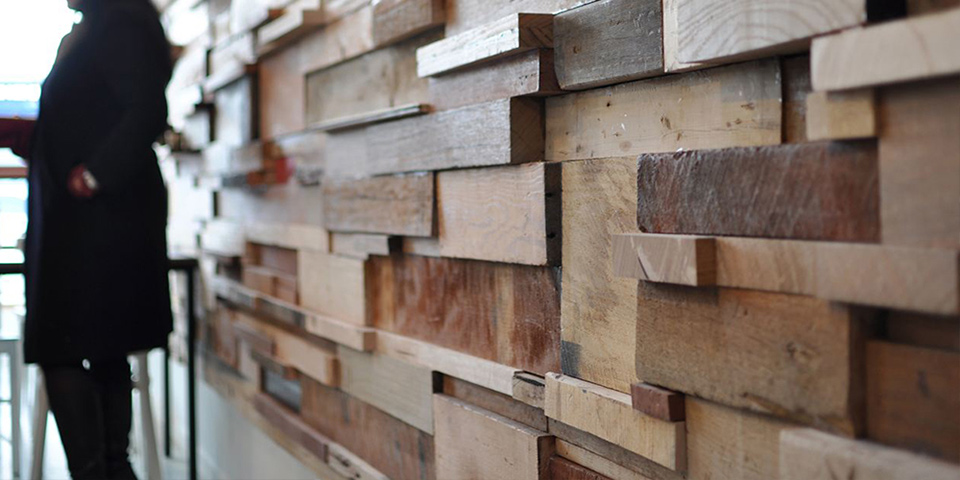 Wall cladding formed from recycled timber offcuts gathered from local furniture-makers. Designed by Anne-Sophie Poirier (aka Sasufi) for Slowpoke Espresso, a small café in Melbourne, Australia.