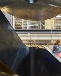 Staircase in blackened stainless steel with over-wax finish for Google, 6 Pancras Square, London, UK