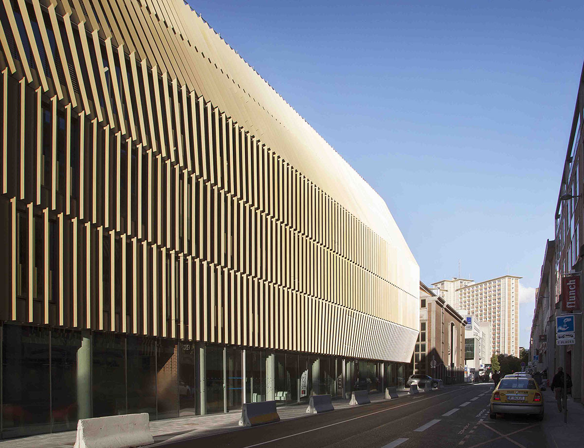 Showing the bronze aluminium blades forming the façade of The Conex Building, Lille by architects By Chartier-Corbosson and VS-A