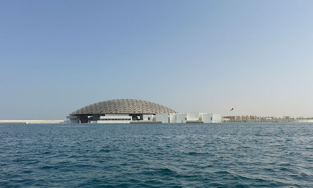 The Louvre, Abu Dhabi as seen from the sea. - © Photography by Roland Halbe - Architecture by Jean Nouvel. Engineering by BuroHappold. Steel construction by Waagner Biro.