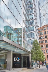 Frameless Glazed Satin Stainless Steel Canopy. 1 Broadgate Quarter, Snowden St, London, EC2A 2AW - Architects: John Robertson Architects. - Stainless Steel Canopy: John Desmond Ltd. - The upgraded building design has helped create a contemporary and enticing streetscape.