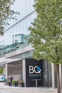 Frameless Glazed Satin Stainless Steel Canopy. 1 Broadgate Quarter, Snowden St, London, EC2A 2AW - Architects: John Robertson Architects. - Stainless Steel Canopy: John Desmond Ltd. - The canopy helps create a streamlined and sophisticated streetscape.