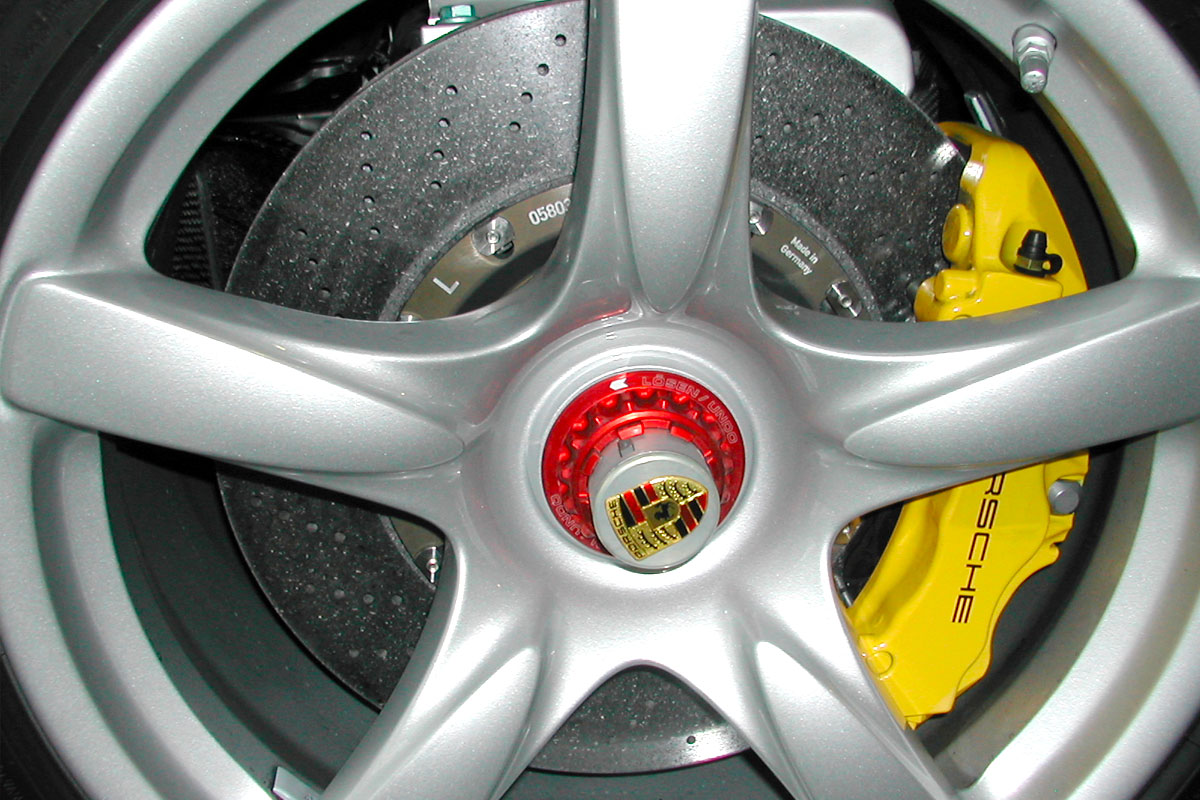 Porsche Carrera GT's silicon carbide brake disc. This carbon-silicon composite is able to withstand extreme temperatures generated by high performance cars when braking.