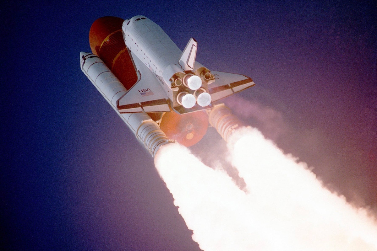 NASA space shuttle and launcher rockets heading into space after take-off. Nickel and other metals are used to create high strength metal alloys for space-craft construction.