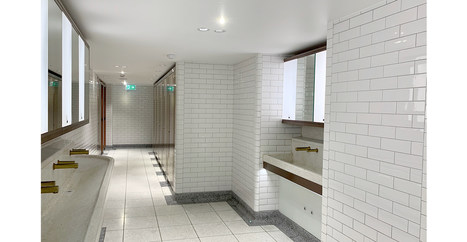 The facilities are spacious, bright and with a carefully selected colour palette, the aesthetic has a wide appeal. London Victoria Rail Station WC. - Architects Landolt + Brown. Fit out contractor Maxwood Washrooms.