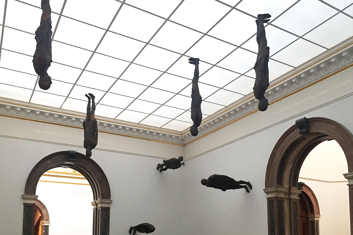 Lost Horizon - cast iron human figures - actual reproductions of Antony Gormley's body - exhibited at the Royal Academy. The artist remained still while he was encased in wet plaster. Photograph: Antonio Moll