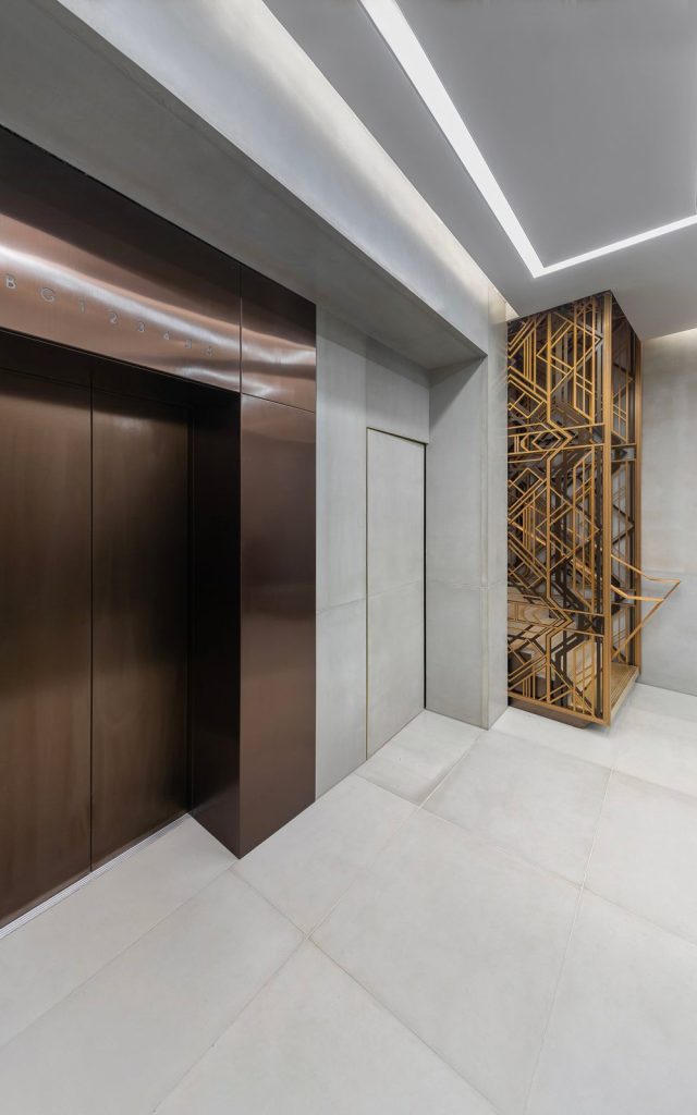 Elevator door skins, overhead and side panels in PVD coloured stainless steel Chocolate Vibration. - Axtell House, 23-24 Warwick St, Soho, London W1B 5NQ - Renovated office building - Architects: Darling Associates - Client: E&A Property Investment Company - PVD coloured stainless steel: John Desmond Ltd