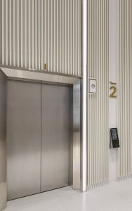 Elevator door skins in PVD coloured stainless steel in Nickel Brush with Brass Mirror edge detailing. - Krungsri Ploenchit Tower, Thailand. - Elevator: A global elevator brand - Architecture and design: Palmer & Turner, Hong Kong - PVD coloured stainless steel by Double Stone Steel in partnership with John Desmond Ltd.