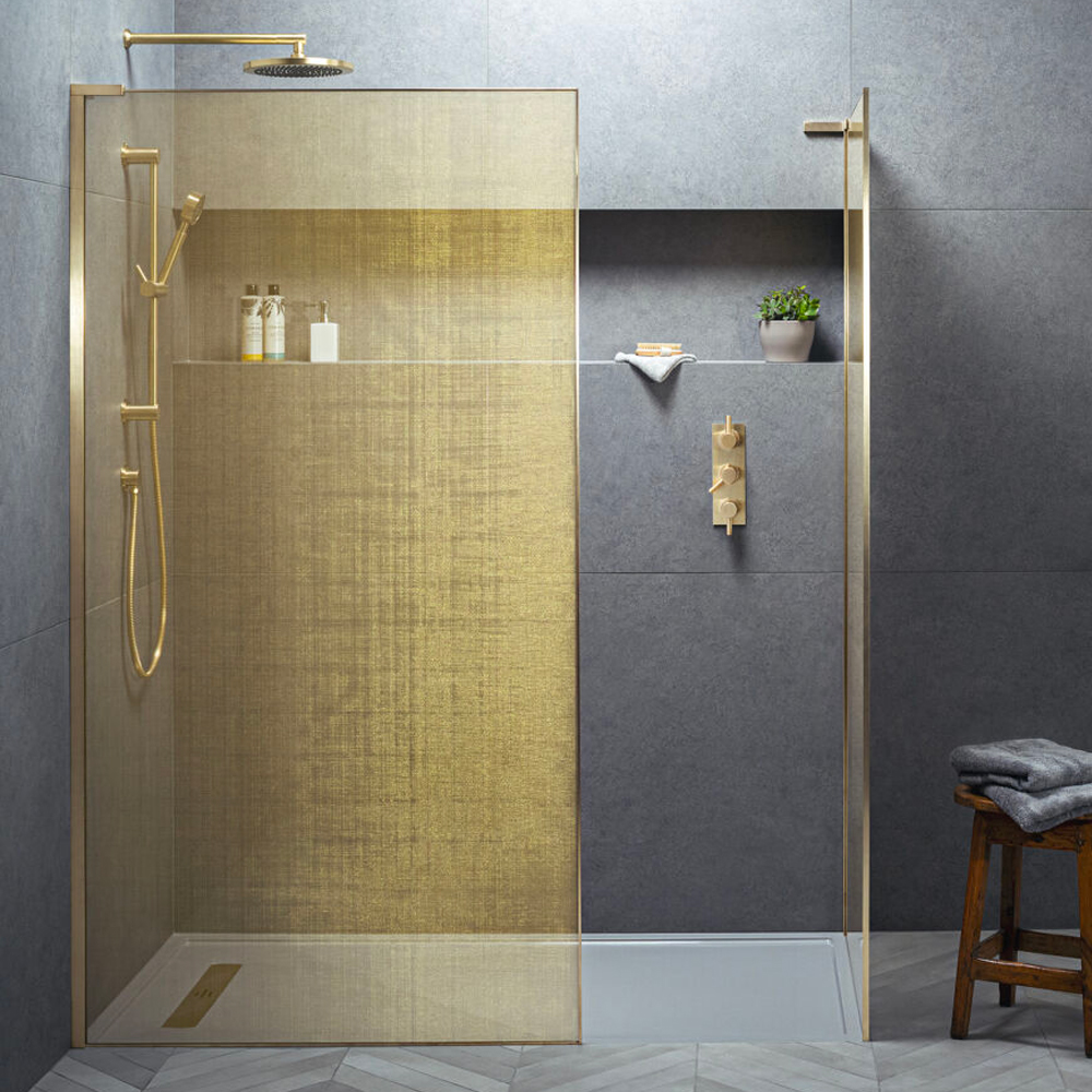 Shower screen edging in brass, available from Matki, also with the added detail of brass mesh integrated into the glass door.